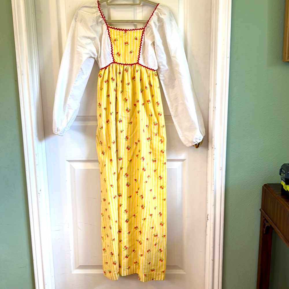 Vintage 70’s maxi dress w/ white puff sleeves & yellow skirt w/ red strawberries